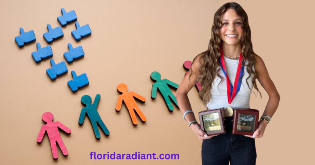 A young girl displays a trophy and a medal, symbolizing her success and dedication in a recent competition or event.