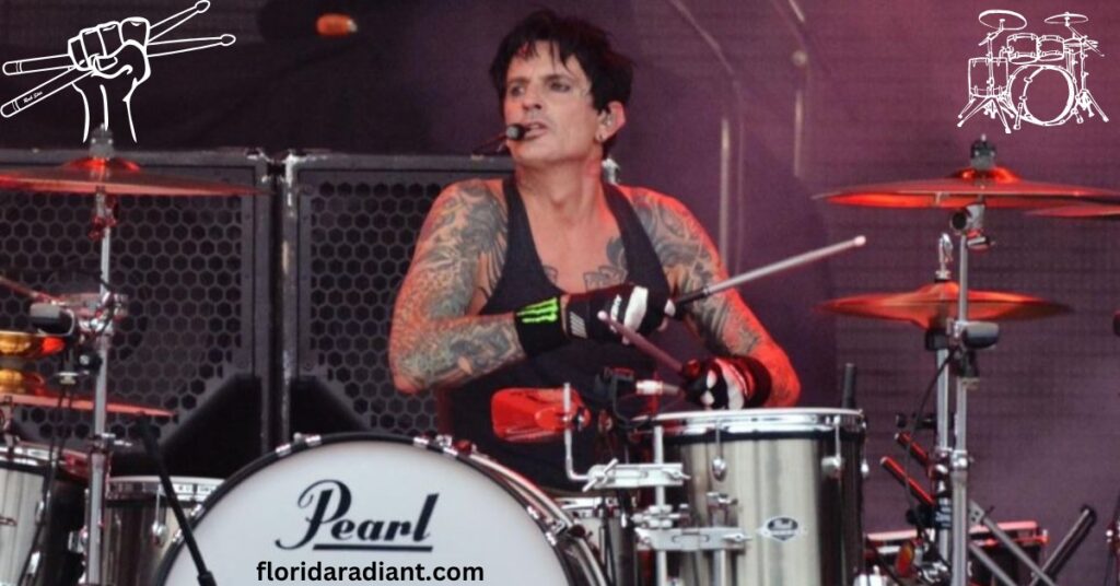  A tattooed man passionately playing drums, highlighting his skill and dedication to the art of music performance.
