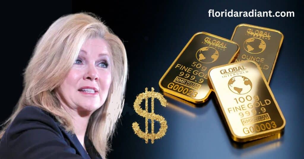 A woman dressed in a suit stands proudly, holding gold bars, representing financial achievement and empowerment.