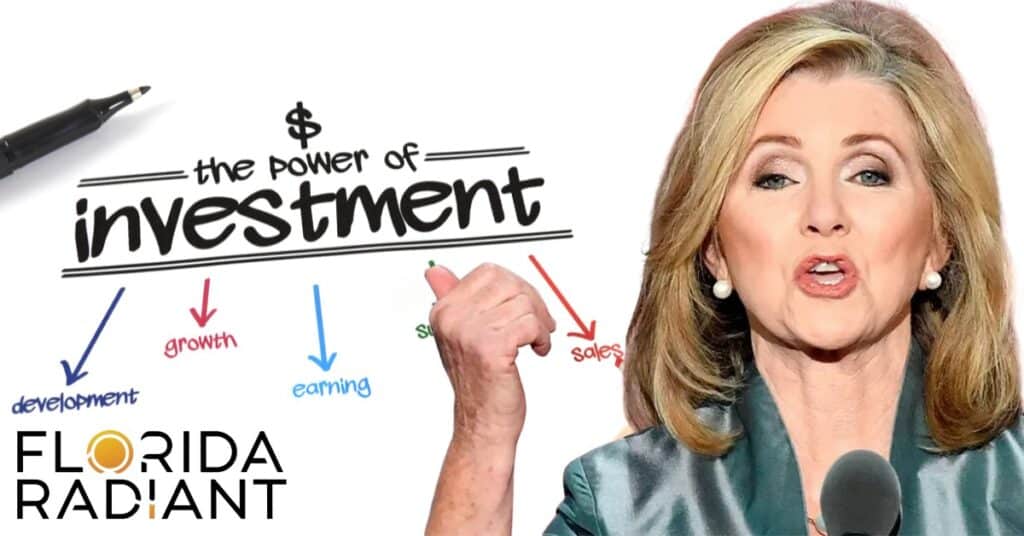 Marsha Blackburn writes "The Power of Investment" with a pen, symbolizing her advocacy for financial empowerment.