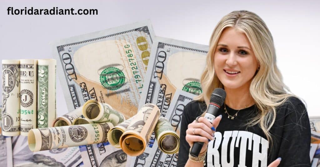 A woman stands with a microphone in her right hand and a bundle of cash in her left, representing ambition and financial achievement.