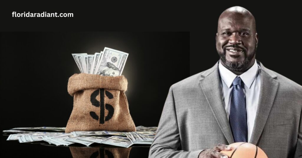 Dressed in a suit, a man holds a basketball and a money bag, representing the intersection of sports and financial success.